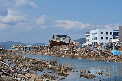 Tsunami in kesennuma city ascending the okawa river